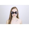 Жіночі сонцезахисні окуляри 12590 чорні з бузковою лінзою 